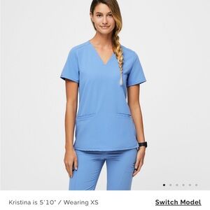 Figs scrub in ceil blue- xxs top and xxs petite bottom. Used but good condition